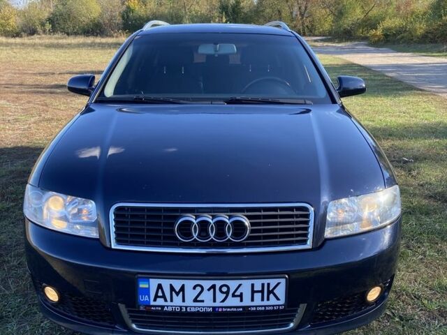 Синий Ауди А4, объемом двигателя 1.6 л и пробегом 243 тыс. км за 5500 $, фото 1 на Automoto.ua
