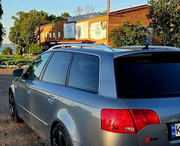 Синий Ауди А4, объемом двигателя 3 л и пробегом 322 тыс. км за 9100 $, фото 1 на Automoto.ua