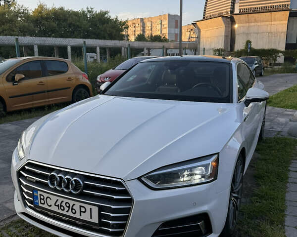 Белый Ауди А5, объемом двигателя 1.98 л и пробегом 121 тыс. км за 25000 $, фото 1 на Automoto.ua