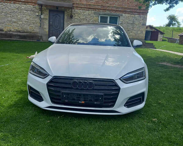 Білий Ауді A5, об'ємом двигуна 1.98 л та пробігом 129 тис. км за 26999 $, фото 1 на Automoto.ua