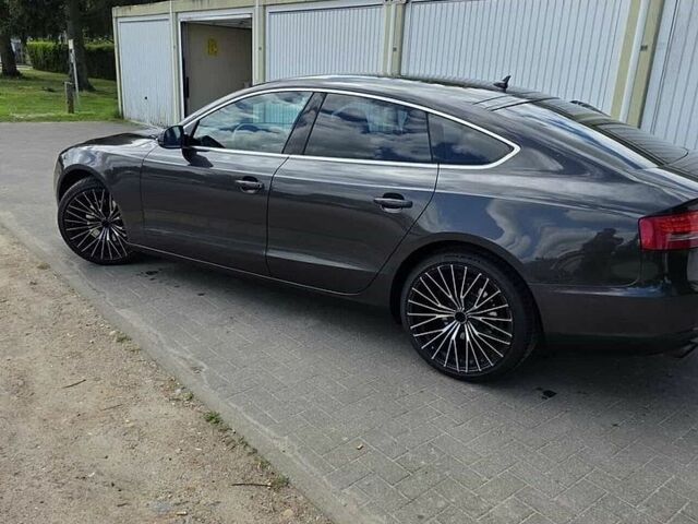 Черный Ауди А5, объемом двигателя 2 л и пробегом 210 тыс. км за 5239 $, фото 1 на Automoto.ua