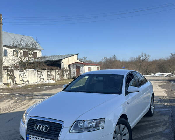 Белый Ауди А6, объемом двигателя 2.39 л и пробегом 236 тыс. км за 6950 $, фото 1 на Automoto.ua