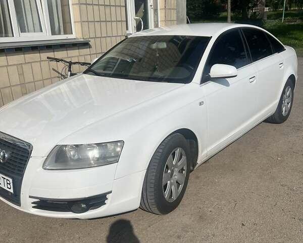 Белый Ауди А6, объемом двигателя 1.97 л и пробегом 247 тыс. км за 8200 $, фото 1 на Automoto.ua