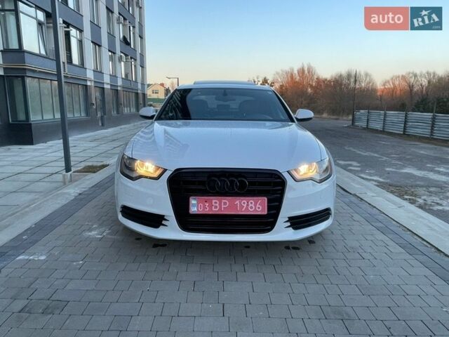 Білий Ауді А6, об'ємом двигуна 1.98 л та пробігом 146 тис. км за 11600 $, фото 1 на Automoto.ua