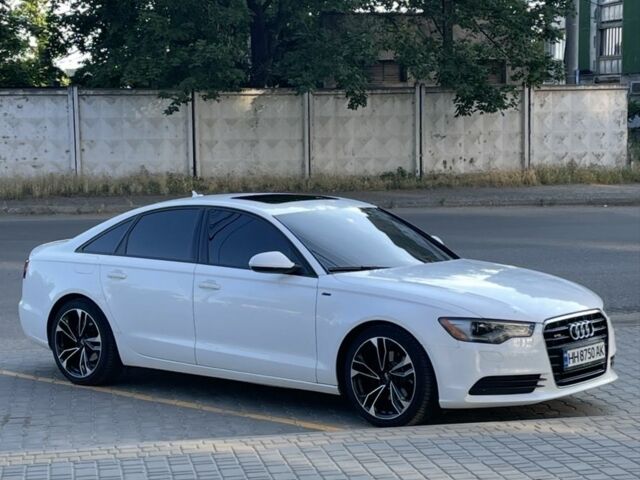 Белый Ауди А6, объемом двигателя 2 л и пробегом 168 тыс. км за 14051 $, фото 1 на Automoto.ua