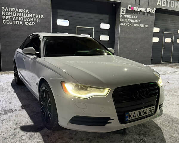 Білий Ауді А6, об'ємом двигуна 1.98 л та пробігом 208 тис. км за 12100 $, фото 1 на Automoto.ua