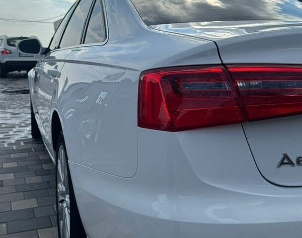 Белый Ауди А6, объемом двигателя 2 л и пробегом 220 тыс. км за 12500 $, фото 1 на Automoto.ua