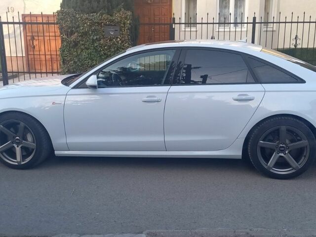 Белый Ауди А6, объемом двигателя 3 л и пробегом 70 тыс. км за 19500 $, фото 1 на Automoto.ua