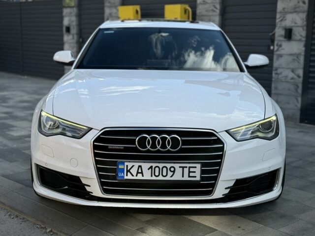 Білий Ауді А6, об'ємом двигуна 2 л та пробігом 270 тис. км за 12496 $, фото 1 на Automoto.ua