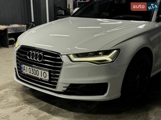 Белый Ауди А6, объемом двигателя 2.97 л и пробегом 228 тыс. км за 21599 $, фото 1 на Automoto.ua