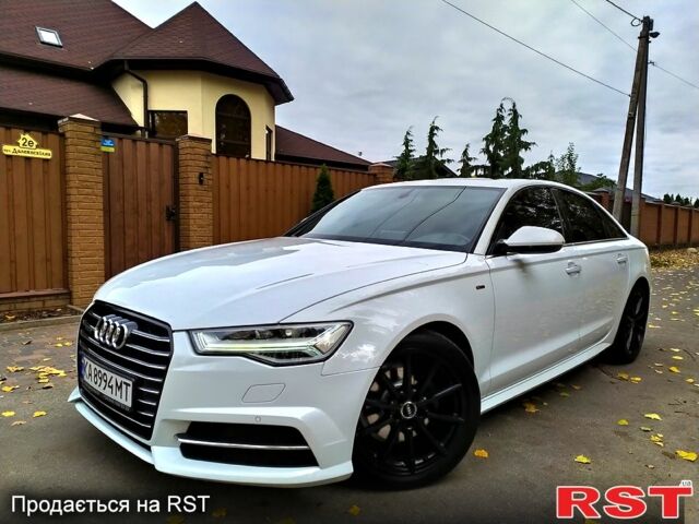 Білий Ауді А6, об'ємом двигуна 2 л та пробігом 85 тис. км за 24500 $, фото 1 на Automoto.ua