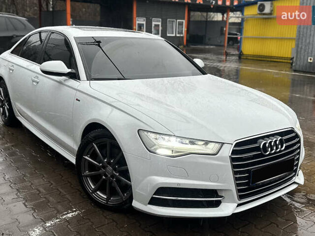 Белый Ауди А6, объемом двигателя 1.97 л и пробегом 162 тыс. км за 24800 $, фото 1 на Automoto.ua