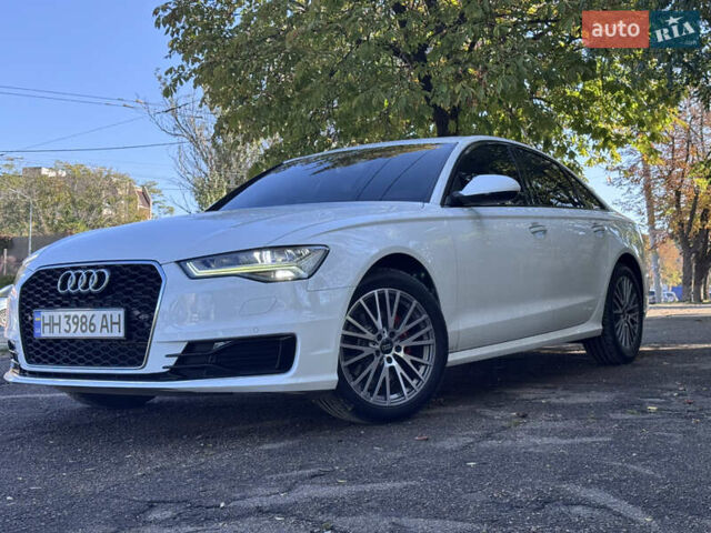 Белый Ауди А6, объемом двигателя 1.97 л и пробегом 147 тыс. км за 22600 $, фото 1 на Automoto.ua