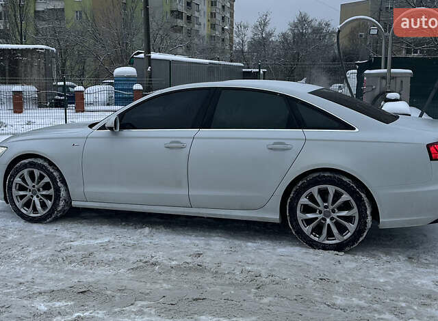 Білий Ауді А6, об'ємом двигуна 2 л та пробігом 210 тис. км за 18900 $, фото 1 на Automoto.ua