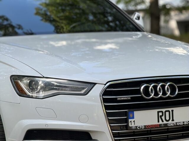 Белый Ауди А6, объемом двигателя 2 л и пробегом 117 тыс. км за 18699 $, фото 1 на Automoto.ua