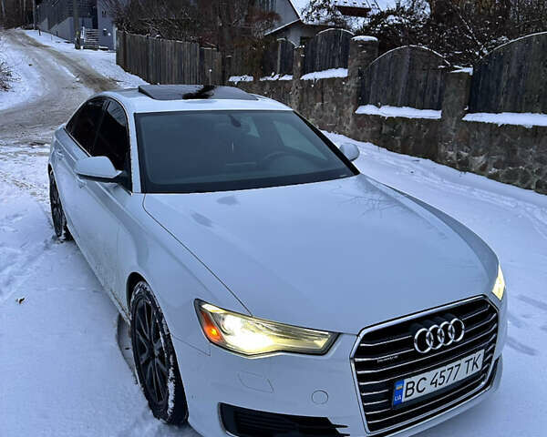 Білий Ауді А6, об'ємом двигуна 1.98 л та пробігом 201 тис. км за 14750 $, фото 1 на Automoto.ua