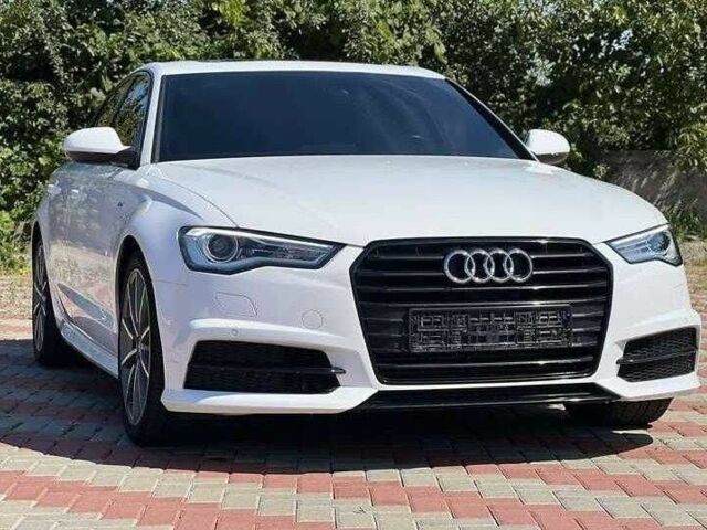 Белый Ауди А6, объемом двигателя 2 л и пробегом 142 тыс. км за 11500 $, фото 1 на Automoto.ua