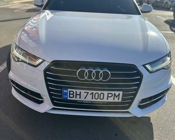 Белый Ауди А6, объемом двигателя 1.98 л и пробегом 100 тыс. км за 21000 $, фото 1 на Automoto.ua