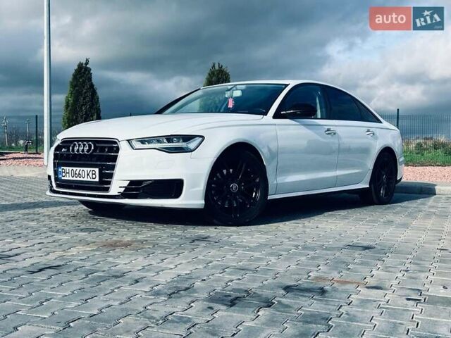Белый Ауди А6, объемом двигателя 1.97 л и пробегом 240 тыс. км за 18499 $, фото 1 на Automoto.ua