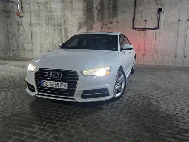 Білий Ауді А6, об'ємом двигуна 2 л та пробігом 134 тис. км за 14706 $, фото 1 на Automoto.ua