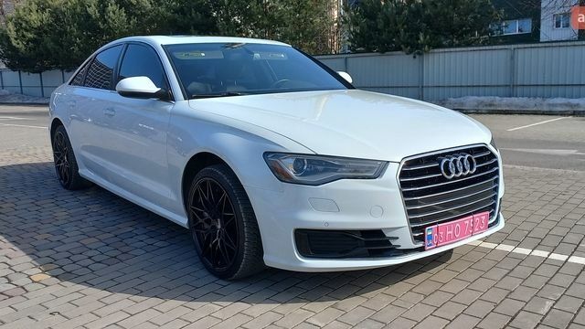 Белый Ауди А6, объемом двигателя 1.98 л и пробегом 214 тыс. км за 15500 $, фото 1 на Automoto.ua