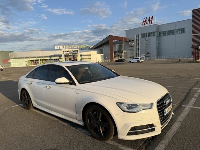 Белый Ауди А6, объемом двигателя 2 л и пробегом 160 тыс. км за 16530 $, фото 1 на Automoto.ua