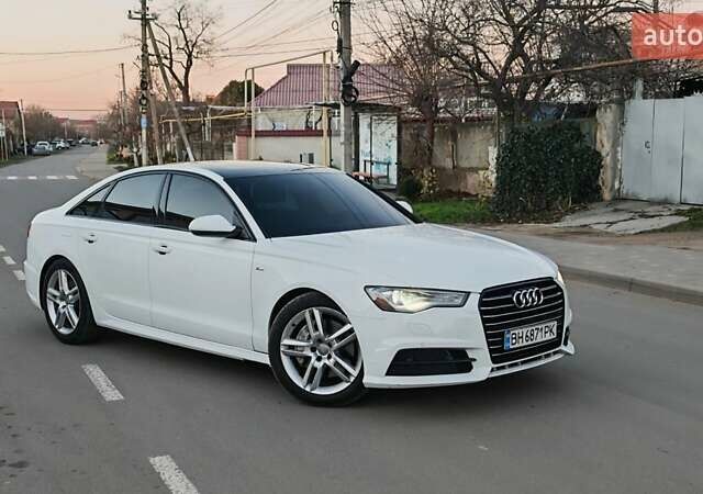 Белый Ауди А6, объемом двигателя 1.98 л и пробегом 113 тыс. км за 13700 $, фото 1 на Automoto.ua