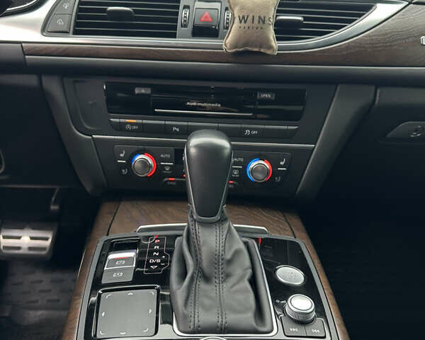 Білий Ауді А6, об'ємом двигуна 1.97 л та пробігом 202 тис. км за 25000 $, фото 1 на Automoto.ua