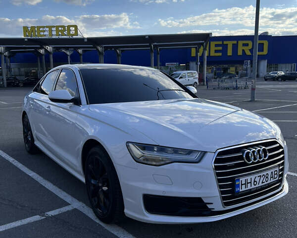 Белый Ауди А6, объемом двигателя 2 л и пробегом 150 тыс. км за 25000 $, фото 1 на Automoto.ua