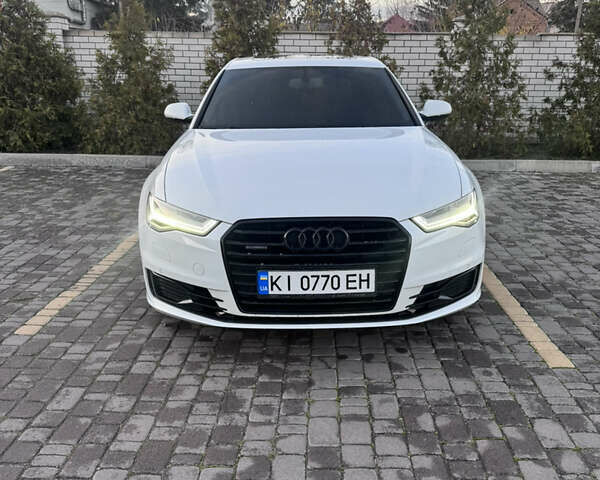 Белый Ауди А6, объемом двигателя 1.97 л и пробегом 103 тыс. км за 27500 $, фото 1 на Automoto.ua