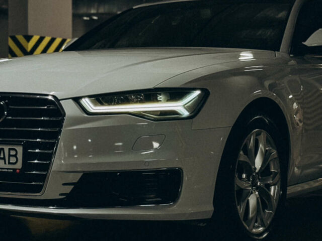 Білий Ауді А6, об'ємом двигуна 2 л та пробігом 156 тис. км за 23000 $, фото 1 на Automoto.ua