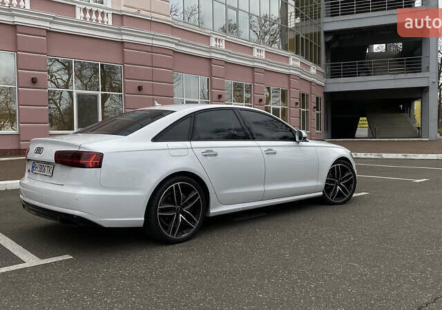 Белый Ауди А6, объемом двигателя 2 л и пробегом 83 тыс. км за 25300 $, фото 1 на Automoto.ua