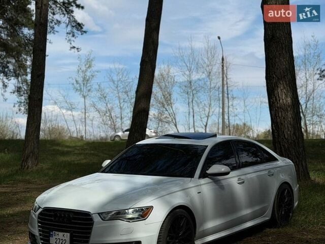 Белый Ауди А6, объемом двигателя 1.98 л и пробегом 165 тыс. км за 16500 $, фото 1 на Automoto.ua