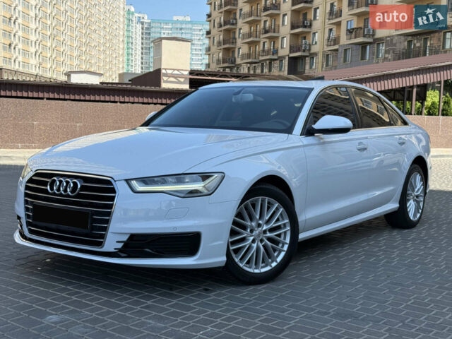 Белый Ауди А6, объемом двигателя 2 л и пробегом 124 тыс. км за 22999 $, фото 1 на Automoto.ua