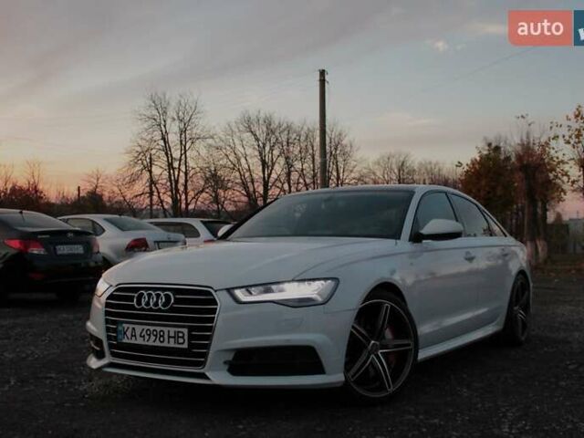 Белый Ауди А6, объемом двигателя 1.98 л и пробегом 65 тыс. км за 22500 $, фото 1 на Automoto.ua