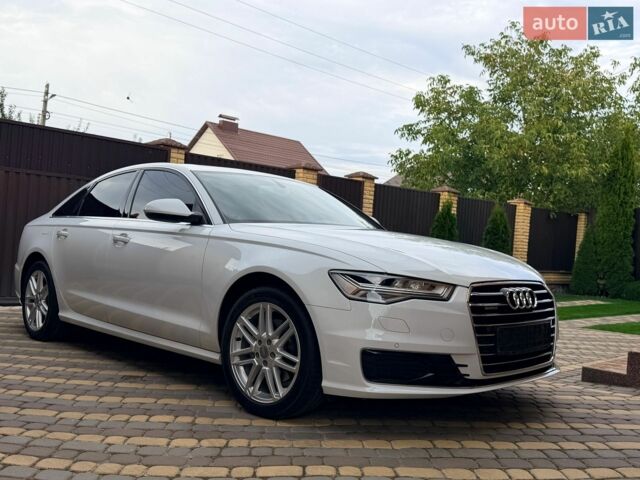 Білий Ауді А6, об'ємом двигуна 2 л та пробігом 94 тис. км за 25950 $, фото 1 на Automoto.ua