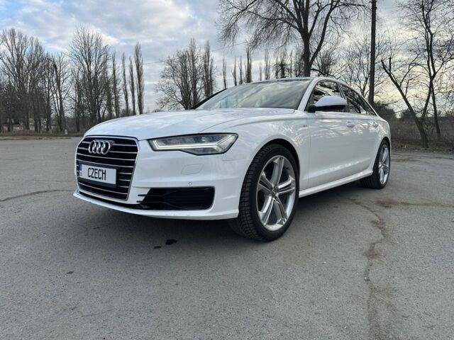 Белый Ауди А6, объемом двигателя 1.8 л и пробегом 56 тыс. км за 21700 $, фото 1 на Automoto.ua