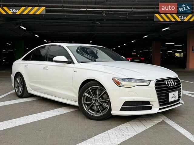 Белый Ауди А6, объемом двигателя 1.98 л и пробегом 163 тыс. км за 17990 $, фото 1 на Automoto.ua