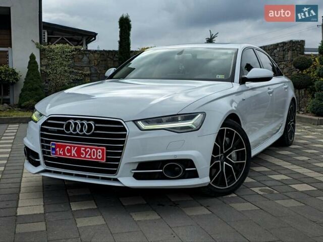 Білий Ауді А6, об'ємом двигуна 2 л та пробігом 192 тис. км за 17777 $, фото 1 на Automoto.ua