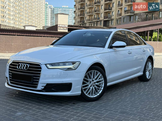 Белый Ауди А6, объемом двигателя 2 л и пробегом 124 тыс. км за 23700 $, фото 1 на Automoto.ua