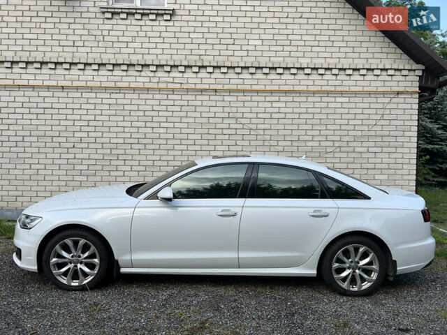 Белый Ауди А6, объемом двигателя 1.97 л и пробегом 237 тыс. км за 23000 $, фото 1 на Automoto.ua