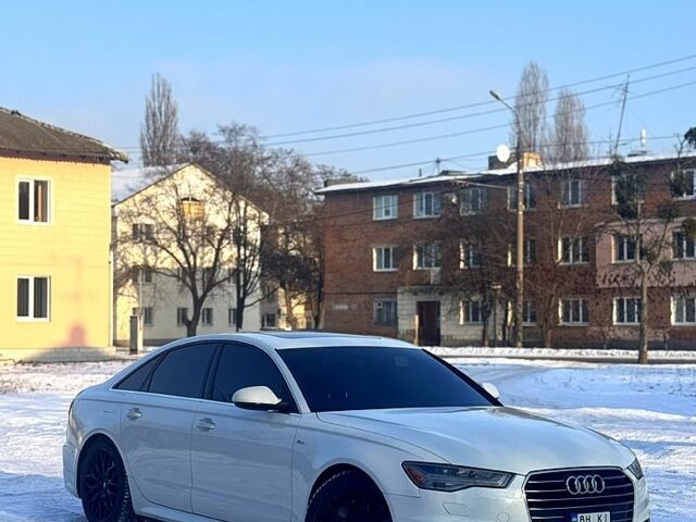 Белый Ауди А6, объемом двигателя 2 л и пробегом 16100 тыс. км за 18000 $, фото 1 на Automoto.ua