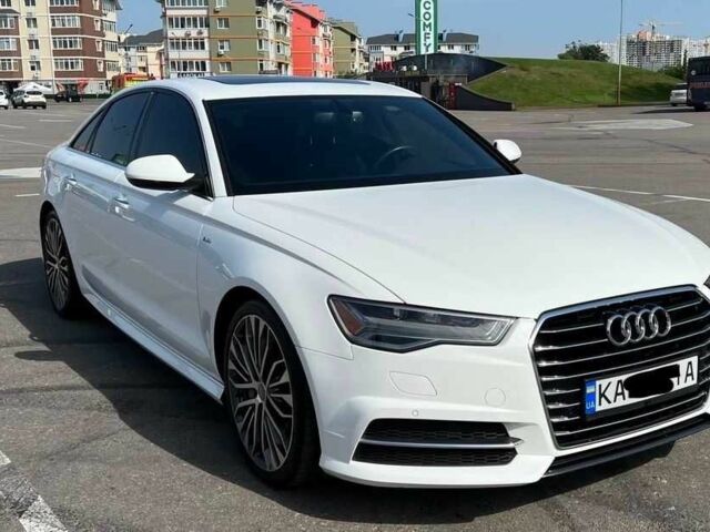 Белый Ауди А6, объемом двигателя 2 л и пробегом 123 тыс. км за 11206 $, фото 1 на Automoto.ua