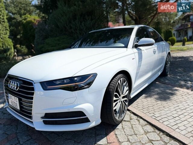 Білий Ауді А6, об'ємом двигуна 1.98 л та пробігом 205 тис. км за 18000 $, фото 1 на Automoto.ua