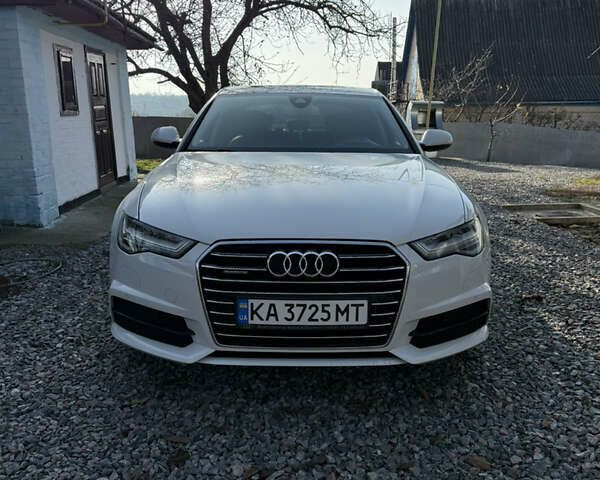 Белый Ауди А6, объемом двигателя 1.97 л и пробегом 75 тыс. км за 29500 $, фото 1 на Automoto.ua