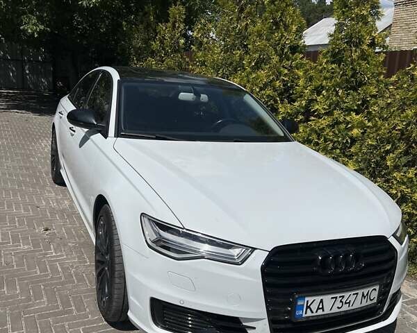 Белый Ауди А6, объемом двигателя 1.97 л и пробегом 111 тыс. км за 24000 $, фото 1 на Automoto.ua