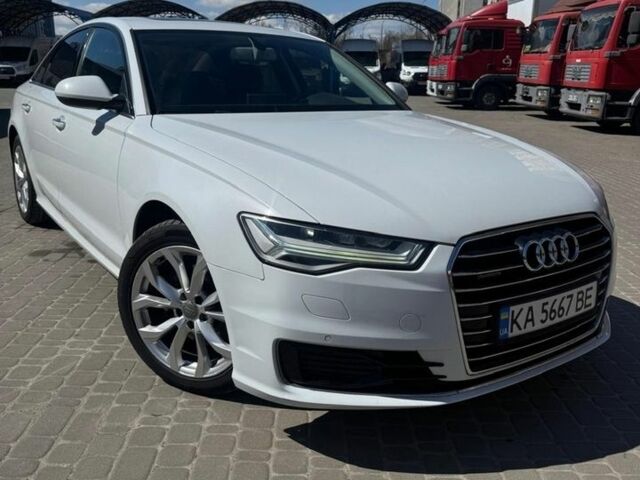 Білий Ауді А6, об'ємом двигуна 1.97 л та пробігом 67 тис. км за 30000 $, фото 1 на Automoto.ua
