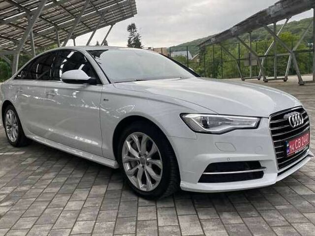 Білий Ауді А6, об'ємом двигуна 2 л та пробігом 73 тис. км за 15300 $, фото 1 на Automoto.ua