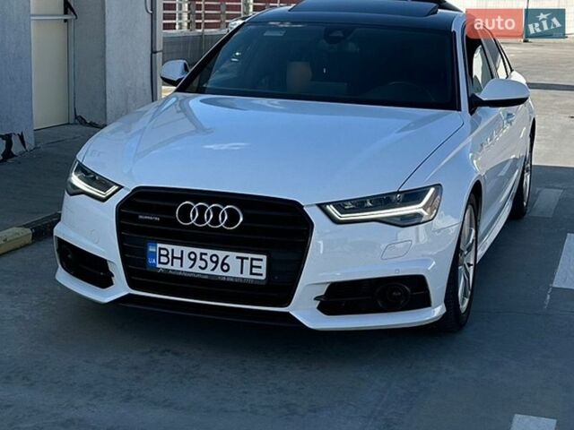 Белый Ауди А6, объемом двигателя 1.98 л и пробегом 77 тыс. км за 25800 $, фото 1 на Automoto.ua