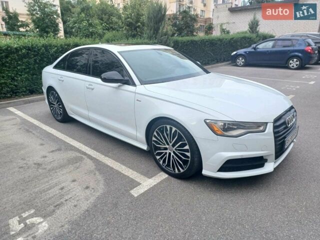 Білий Ауді А6, об'ємом двигуна 2 л та пробігом 72 тис. км за 21500 $, фото 1 на Automoto.ua